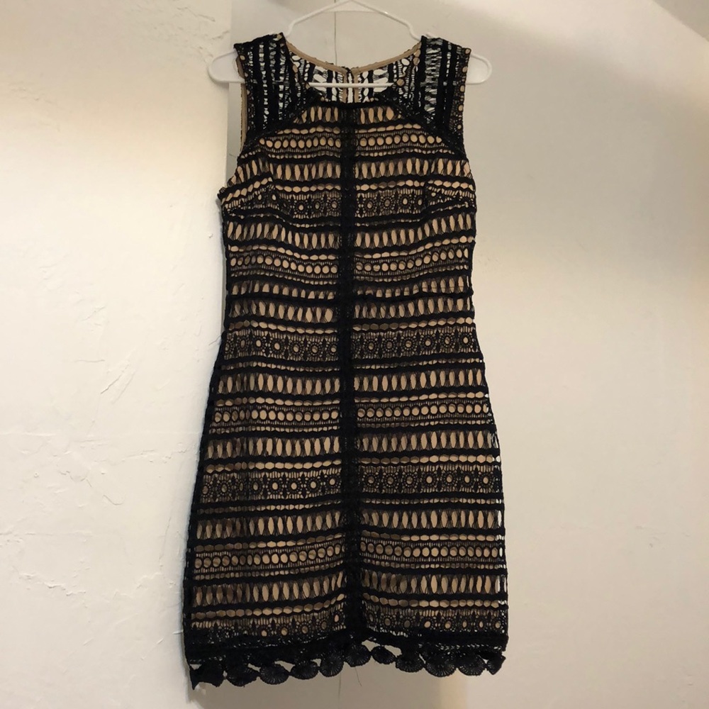 Francesca’s black and nude lace dress